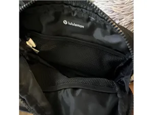 Lululemon large size black camo crossbody bag Good condition- has some faint mar thumbnail 6