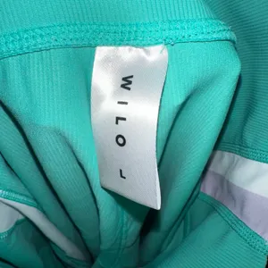 WILO‎ Teal Green Athletic Leggings Women's Size L Colorblock Side Stripe thumbnail 5
