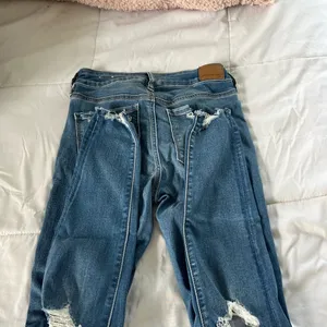 american eagle ripped skinny jeans thumbnail 3