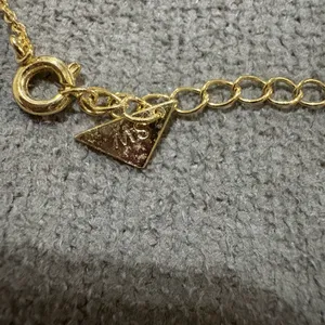 Delicate Gold Necklace with Floral Pendant thumbnail 4