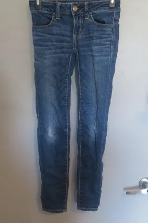American Eagle Outfitters super stretch super low jegging AEO denim jeans in dark wash blue size 00 short. thumbnail 1
