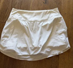 Athleta run with‎ it 14” skort built in shorts medium thumbnail 1