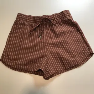 Calia Women's High-Rise Dolphin Shorts in Yucatan Stripe Cinnamon Size XS NWT thumbnail 1