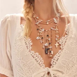 Ariana Ost Free People Something Beautiful Cross Pearl Bead Necklace SOLD OUT thumbnail 1