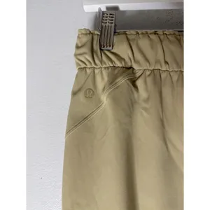 Lululemon On the Fly 7/8 Pant Luxtreme Khaki Tan Jogger Size 6 thumbnail 5