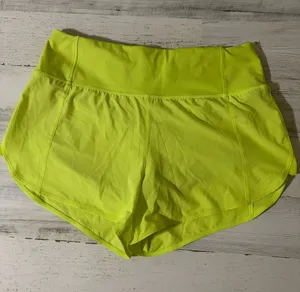 Athleta Neon Yellow Women’s Active Running Shorts Size Small thumbnail 1