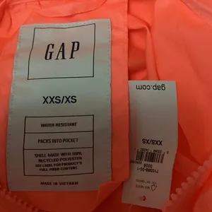 NEW Gap Orange Water Resistant Rain Coat Foldable Windbreaker Jacket Size XXS/XS thumbnail 5