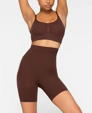SKIMS Sculpting Mid Thigh Shorts in Cocoa Size XX-Small/X-Small thumbnail 1