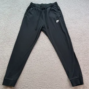 Nike Swift Women’s Running Pants Black Medium Tapered Joggers BV2782-010 thumbnail 1