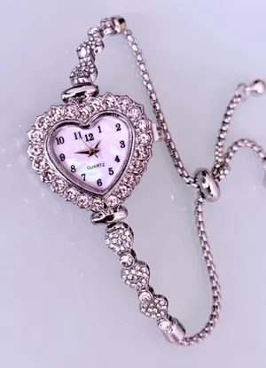 Brand New y2k Silver heart-shaped watch with rhinestone details and adjustable chain thumbnail 1