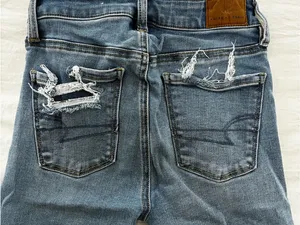 American Eagle Outfitters Ripped Skinny Jeans in Dark Blue thumbnail 4