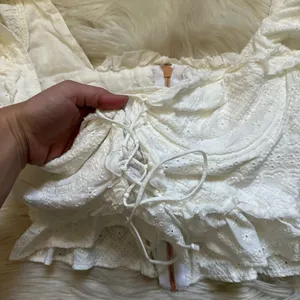 FOR LOVE AND LEMONS Charlotte Eyelet Lace Up Blouse In White thumbnail 9