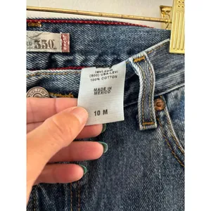 Levi's Womens 550 Relaxed Tapered Jeans Size 10 M Medium Wash Denim Mom 90s thumbnail 4