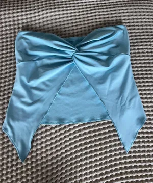 Blue strapless crop top with bow detail #croptop #festival thumbnail 1