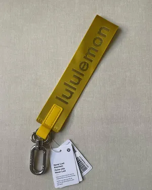 Lululemon Never Lost Keychain - Maize Yellow/Graphite Grey thumbnail 1