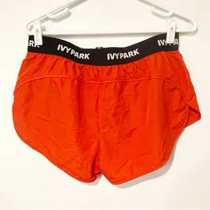 Ivy Park Women's Medium Red Active‎ Logo Taped Mesh Lined Woven Running Shorts thumbnail 5