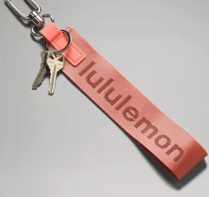 Lululemon‎ Never Lost Keychain- Raspberry Cream/Wine Berry NEW! RETIRED COLOR thumbnail 1