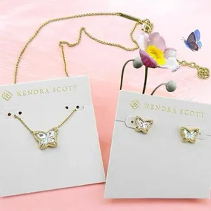 Kendra Scott Lillia Butterfly Gold Stud and Necklace Earrings In Dichroic Glass thumbnail 1