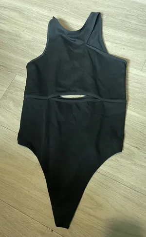Colsie Black Asymmetrical Cutout Bodysuit Size XL thumbnail 1