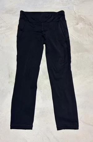 Lululemon Black final lap crop Athletic Leggings 8 thumbnail 1