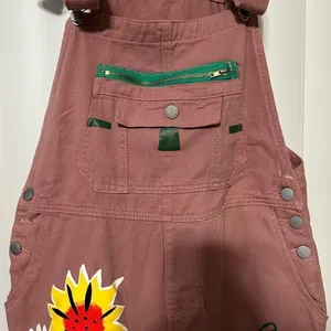 No brand overalls , cute, dusty rose colored with detailed flowers , 2 front poc thumbnail 2