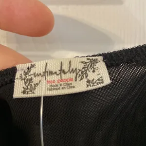 Free People Bodysuit size L color black adjustable stripes please see all photos thumbnail 3