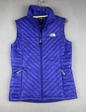 The North Face Women's Quilted Vest in purple with Lime Accents Size: small thumbnail 1