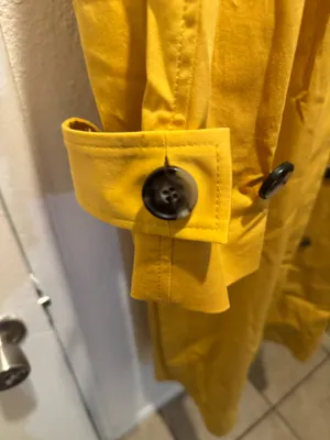 Elegant golden yellow piece by COS. Ideal for versatile styling. thumbnail 3