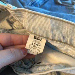 Vintage Levi’s 90s Orange Tab tapered leg 550 denim light wash blue jeans thumbnail 7