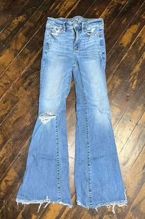 American Eagle medium wash size 2 distressed Flare jeans thumbnail 1