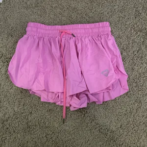 Pink athletic shorts thumbnail 1