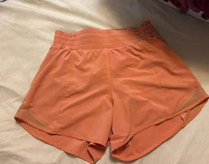 Orange Lululemon Shorts 4" thumbnail 1