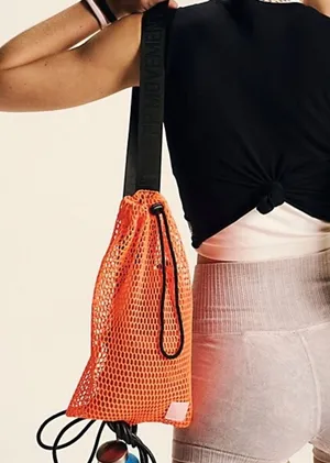 Free People Movement Mini Mesh Sling Bag in Orange thumbnail 1