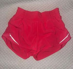 lululemon athletica Bright Pink Women’s Running Shorts with Reflective Accents thumbnail 1