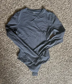 SKIMS Long Sleeve Bodysuit thumbnail 1