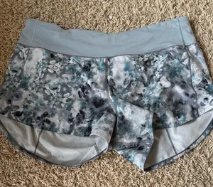 Lululemon Speed Up Low-Rise Short 2.5" in Kaleidofloral Multi / Blue Cast Sz 12 thumbnail 1