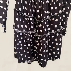 Majorelle black polka dot mini dress with ruffle details and tie-up front Small thumbnail 6