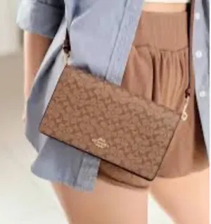 COACH Signature Hayden Folded Over Cross Body Brown 41920 Clutch in Color Block thumbnail 1