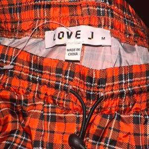 Love-j Women's Orange and Red Trousers thumbnail 3