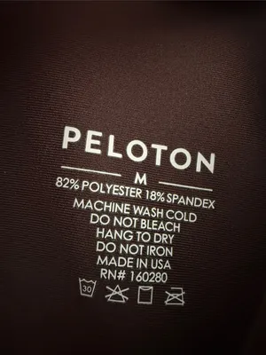 PELOTON Women's Chocolate Brown Asymmetric Cropped Sports Bra with Purple Logo thumbnail 9