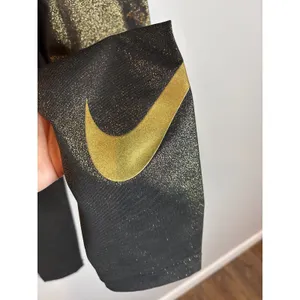 Nike Pro metallic gold and black logo leggings thumbnail 5