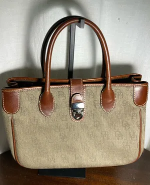 Vintage Dooney & Bourke Tan and Brown Signature Tote thumbnail 1