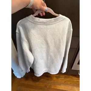 White Fox Boutique sweater features a pink floral graphic L-XL thumbnail 4