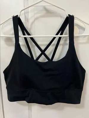 Woman’s size large black sports bra thumbnail 1