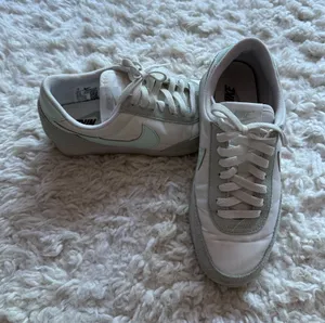 Nike Women's Low-Profile Daybreak Sneakers in Mint Green and White thumbnail 1
