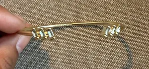 Kendra Scott Gold Open Cuff Bracelet with Pyramid Stud Ends thumbnail 1