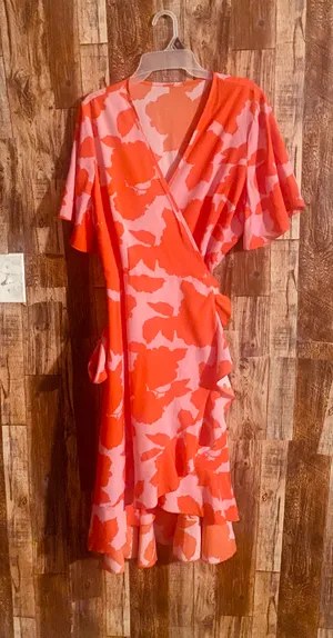 Plus size casual dress women's floral print short sleeve surplice neck ruffle trim asymmetrical hem wrap dress. Orange size 1xl. Like new thumbnail 3