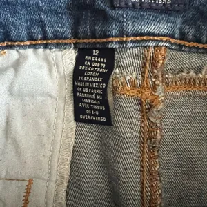 American Eagle denim frayed raw hem mini skirt size 12 thumbnail 4