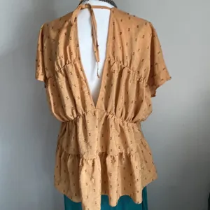 ASOS Sleeveless Front and Back V-Neck Cut Out Tiered Bohemian Textured Blouse thumbnail 4