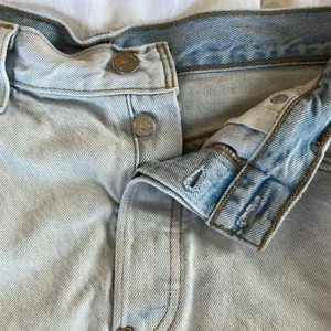Levi's 501 cut off denim shorts with floral embroidery. Size 34 (?) thumbnail 6
